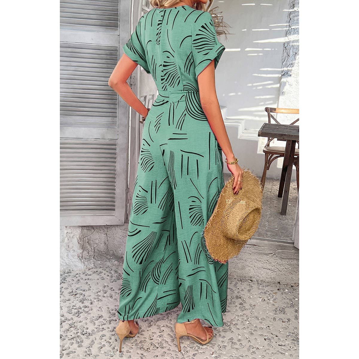 Allover Print V Neck Tie Waist Pockets Jumpsuit - MVTFASHION.COM