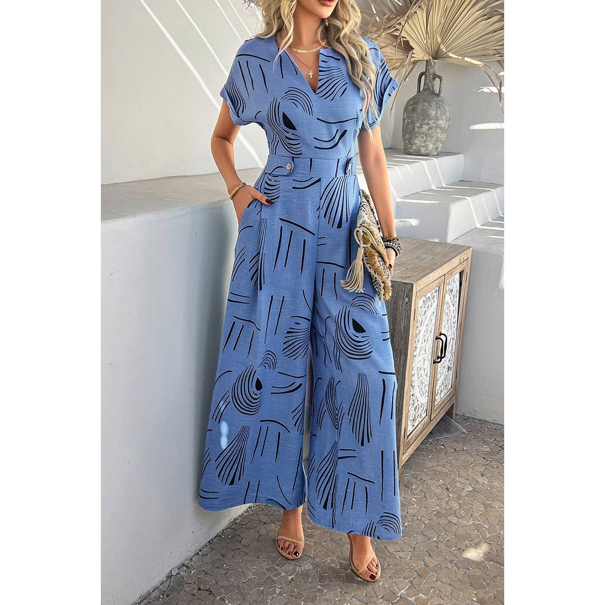 Allover Print V Neck Tie Waist Pockets Jumpsuit - MVTFASHION.COM