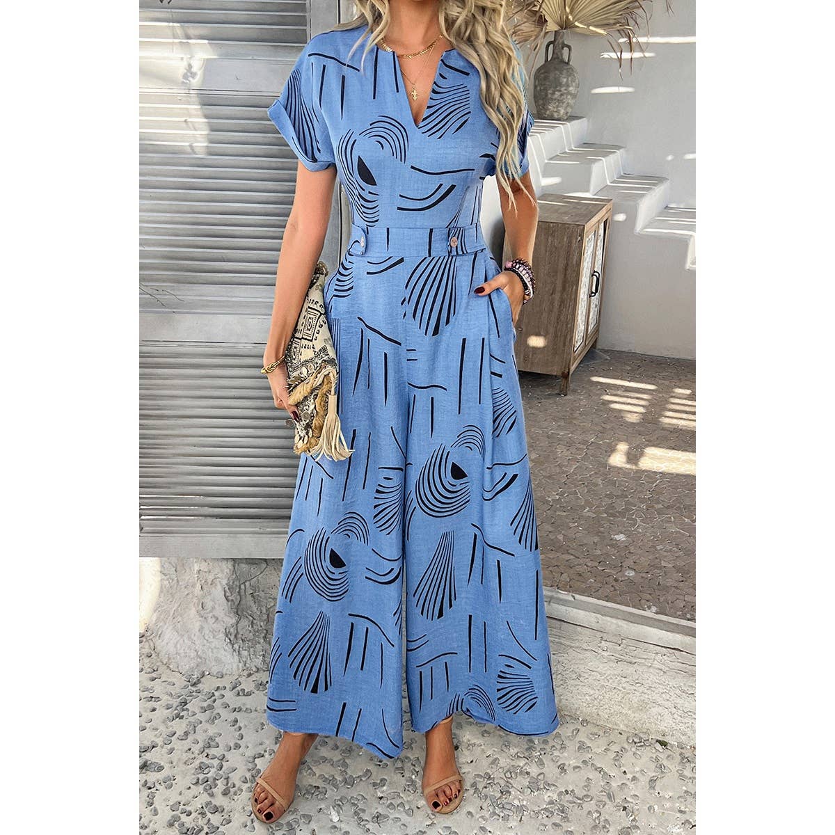 Allover Print V Neck Tie Waist Pockets Jumpsuit - MVTFASHION.COM