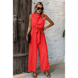 Solid Sleeveless Cut Out Back Belted Jumpsuit - MVTFASHION.COM