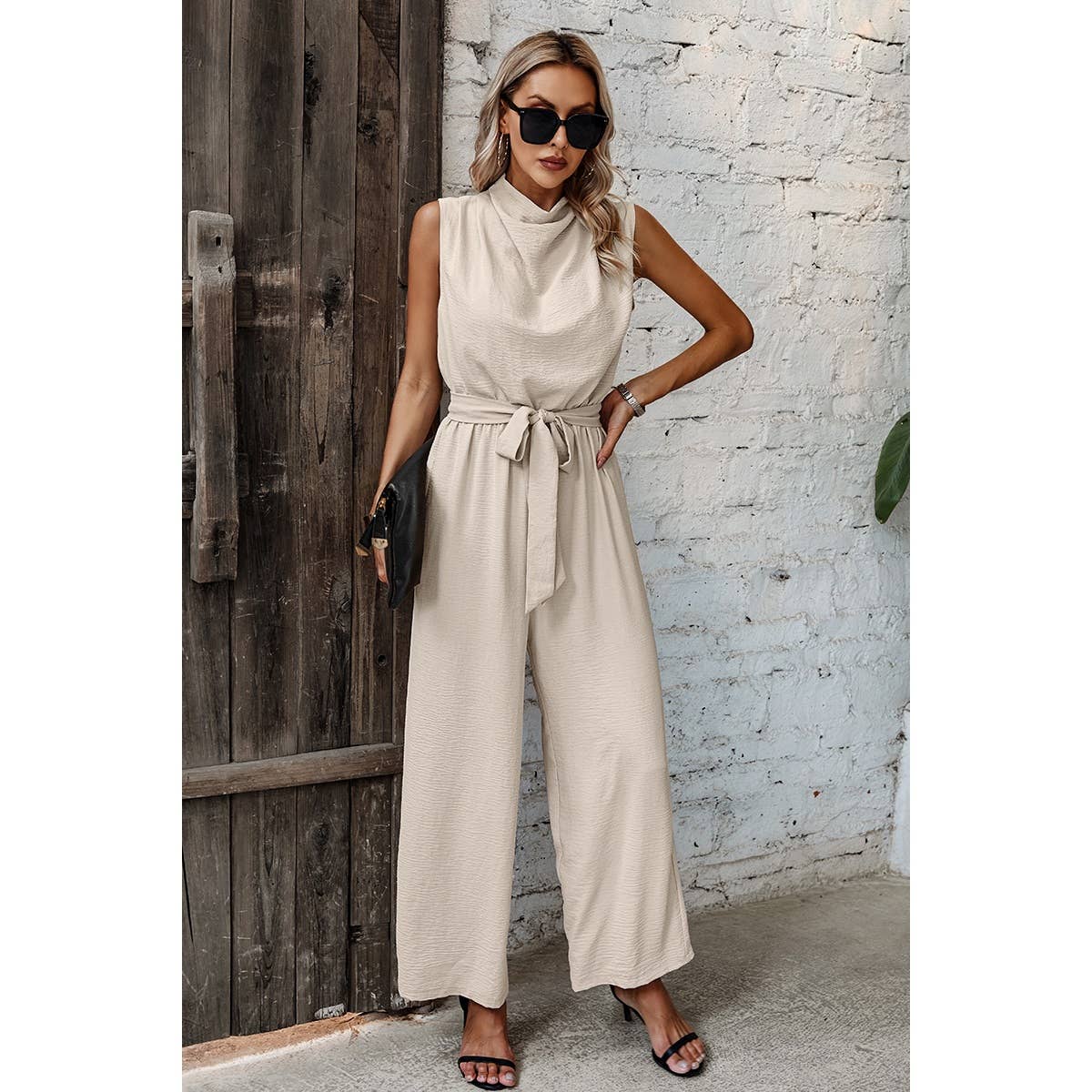 Solid Sleeveless Cut Out Back Belted Jumpsuit - MVTFASHION.COM