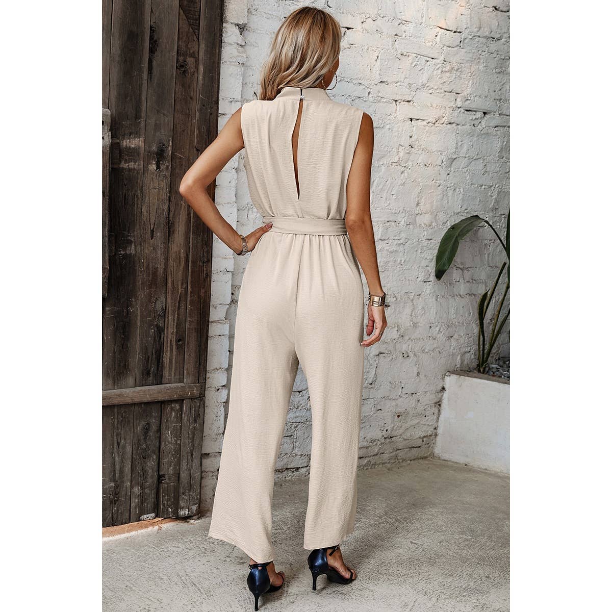 Solid Sleeveless Cut Out Back Belted Jumpsuit - MVTFASHION.COM