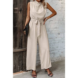 Solid Sleeveless Cut Out Back Belted Jumpsuit - MVTFASHION.COM